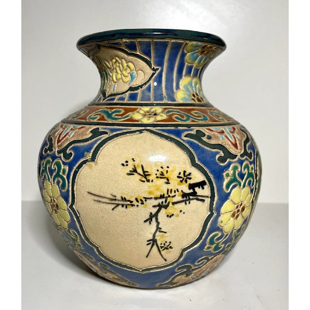Ben Hoa vase from Vietnam showing the 4 seasons in panels. Made circa 1980s.