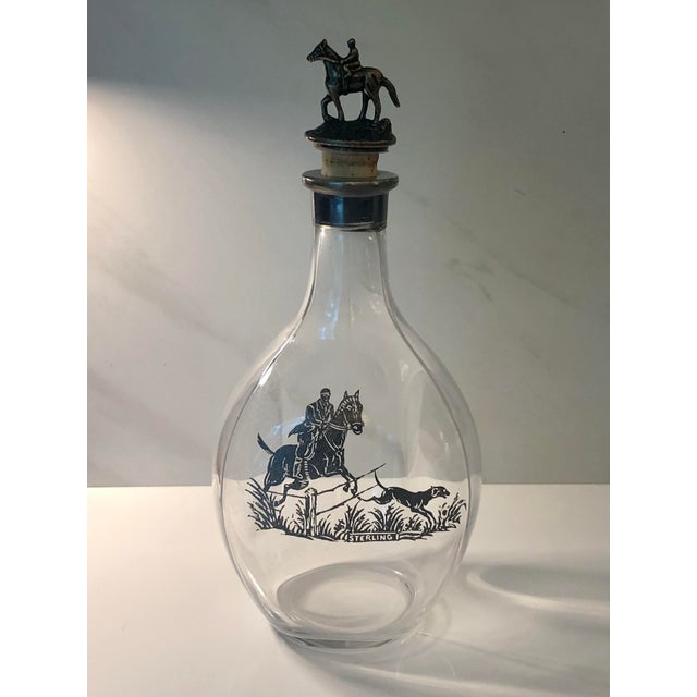 Calling all equestrians, horse jumpers, and fox hunters!! This fabulous 1940s Equestrian Fox Hunt Sterling Decanter will...