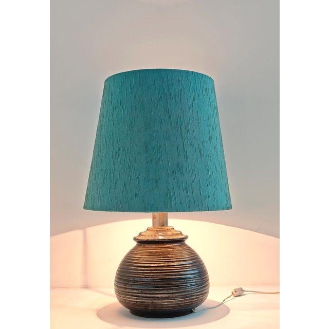 Ruggero giangiacomi for la bottega ii punto. Made in italy, circa 1970. single-light table lamp, silver-glazed ceramic...