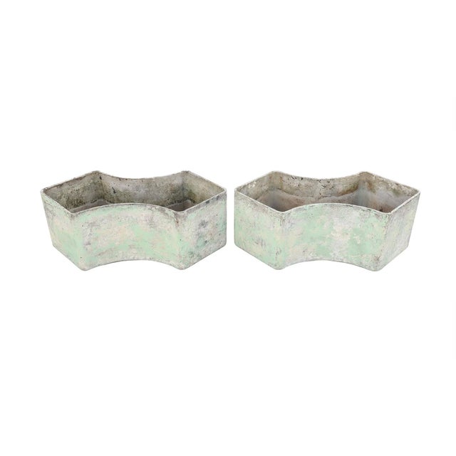 Sculptural and understated, this striking pair of convex planters embodies the quiet elegance of mid-century European...