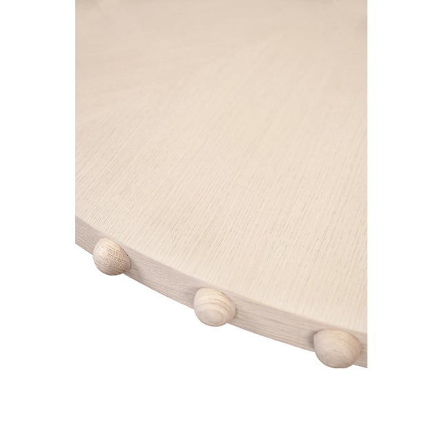 New special order item. Not vintage. The Lucian Round White Oak Dining Table brings timeless elegance to any dining space....