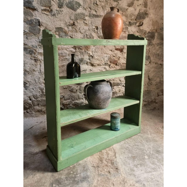 Open shelving unit from Hungary, dating from approximately 1900–1930. Constructed from pine, the piece features four open...
