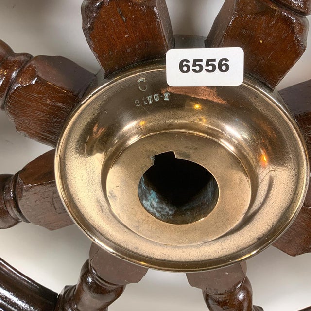 Fine late nineteenth century ships or yacht wheel. Very fine varnish finish. The brass trim ring and center hub have been...