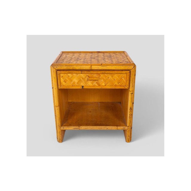 An authentic touch for your home: this vintage bamboo bedside table is a refined example of 1960s/70s craftsmanship....