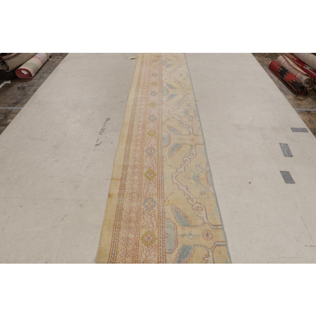 Originating circa 1900-1910, this extraordinary 2’3 x 12’2 runner represents a repurposed fragment of an antique Indian...