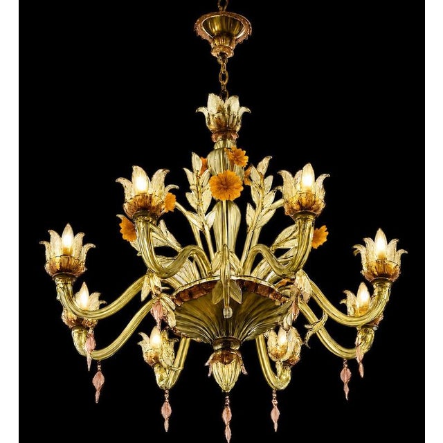 Murano chandelier glass that tells a story. This extraordinary 1950s murano chandelier seems born from a botanical...