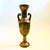 A tall vintage brass amphora vase. Beautiful natural patain with 2 handles formed on the sides. Made in India. Measures...