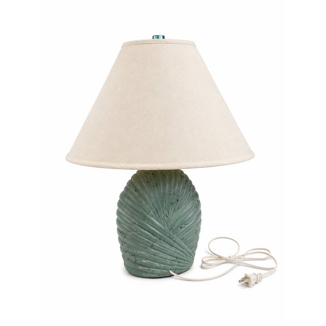 This is an Art Deco Revival ceramic or plaster table lamp. It features a distinctive ribbed, wavy, candy- swirl design in...