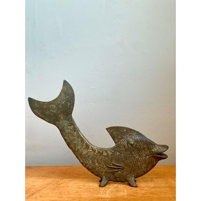 This striking mid-century modern bronze fish figurine exemplifies the playful sophistication and sculptural clarity that...