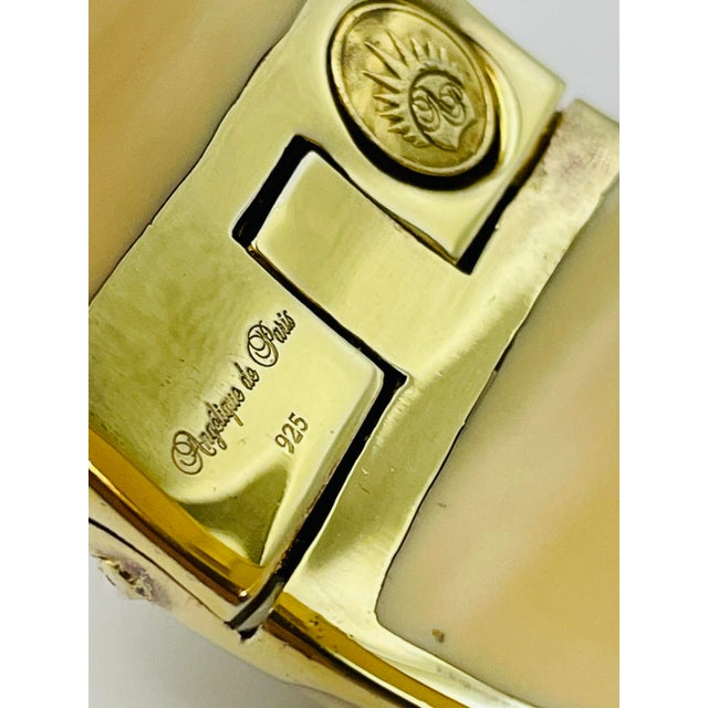 Angelique de Paris wide resin & gold vermeil (gold over .925 sterling silver) hinged bangle bracelet. Signed, c. 1980s,...