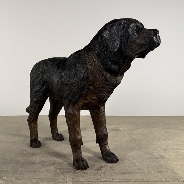 Large-scale bronze sculpture of a mastiff (or St. Bernard), rendered in a naturalistic style that captures the strength of...