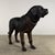 Large-scale bronze sculpture of a mastiff (or St. Bernard), rendered in a naturalistic style that captures the strength of...