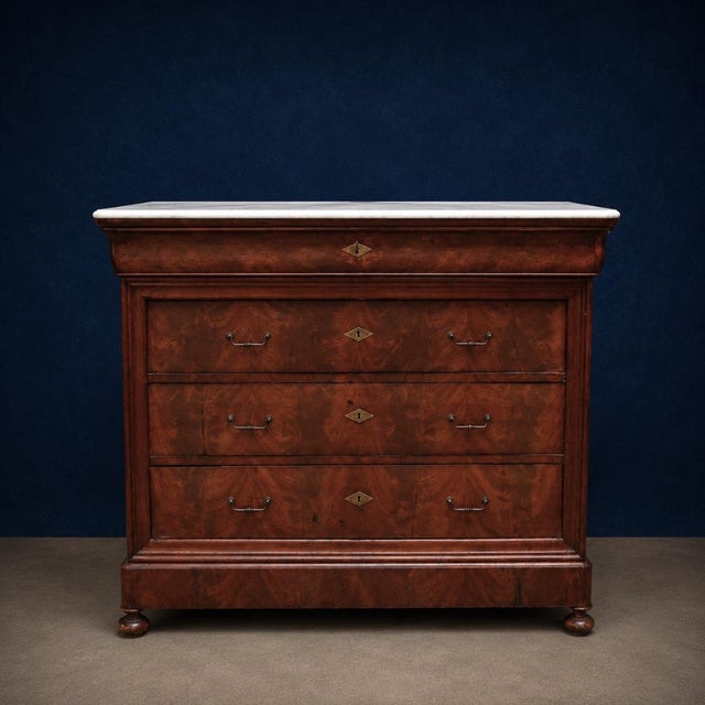 This exquisite 19th Century French Louis Philippe Walnut Marble Top Commode embodies the understated elegance and timeless...