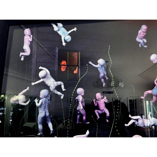 A framed C-Print by American photographer Sandy Skoglund (b. 1946) Maybe Babies. Chromogenic print, signed and inscribed...