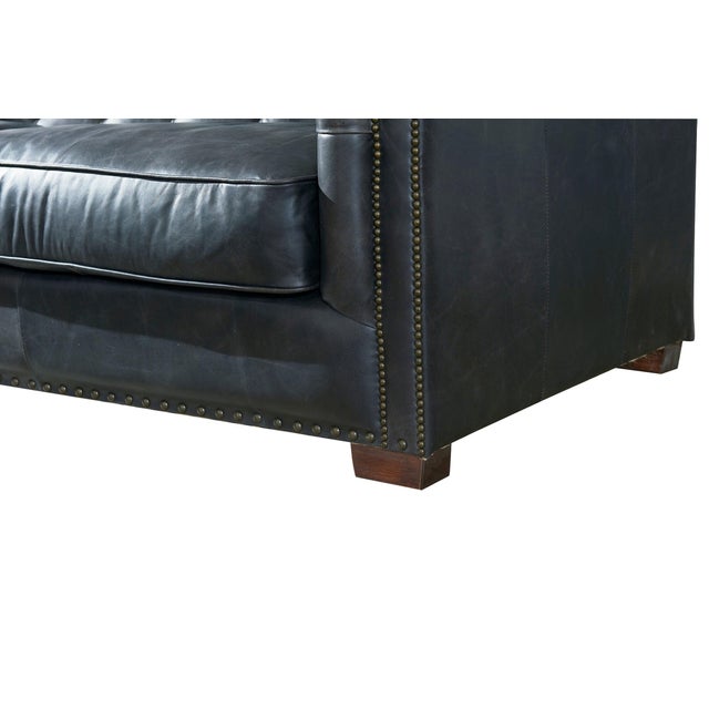 "The Tuxedo Leather Living Room Collection showcases timeless sofa designs with high end materials and construction. Top...