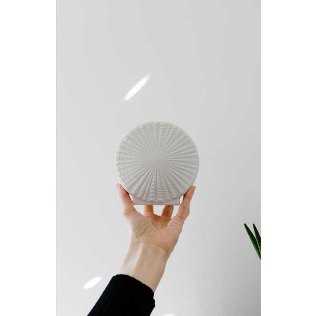 Scarce modernist matte and glazed white porcelain vase expertly created by fine West German porcelain maker Heinrich in...