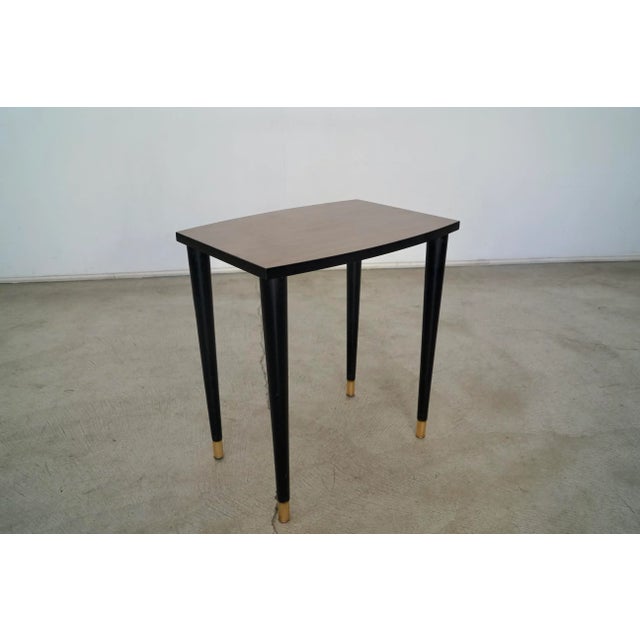 Vintage 1960's Mid-century Modern end table for sale. The perfect size, and very cool look. It's in excellent condition...