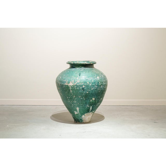 Large antique amphora made of Triana ceramic, Seville, with a green glaze dating from the mid-18th century. Seville,...