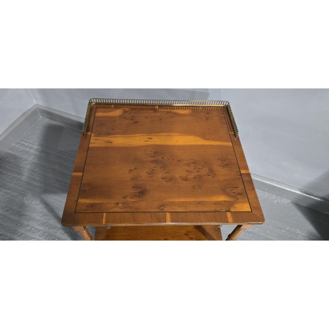 A very good Regency style yew wood Lamp table with brass cup castors, brass gallery, pull out slide. in excellent overall...