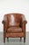 Offered by ByThijs: this vintage sheepskin club armchair with a rich patina and a rugged appearance. : This vintage...
