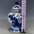 A charming Chinese blue and white porcelain covered jar. The jar has a classic baluster shape and is topped with a...