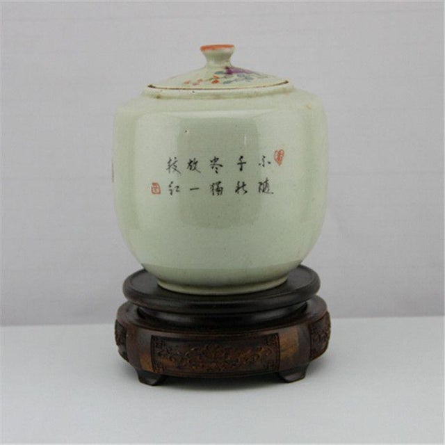 This charming ceramic ginger jar is a delightful decorative piece that brings a touch of vintage elegance to any space....