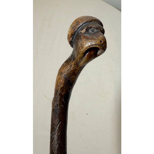 This antique 19th century hand carved Folk Art figural walking stick cane is a unique and original piece of antique décor....