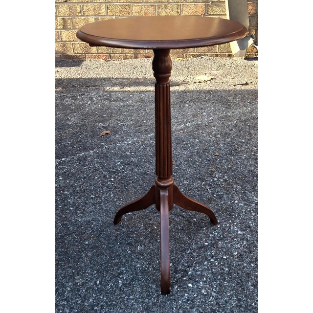 A Late 20th Century Solid Cherry Tripod Pedestal Side Table Candle Stand / Dimensions: 15" in width, 15" in depth and...