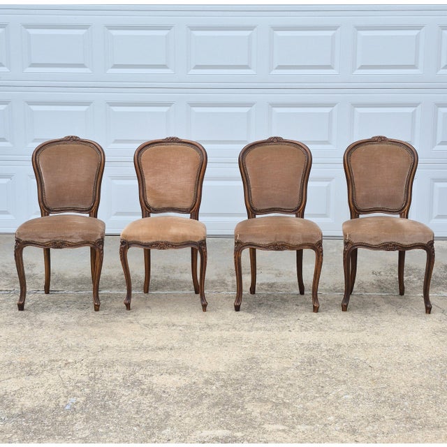 This is an elegant set of 4 Louis XV style dining chairs by Italian furniture maker Chateau d’Ax. The chairs feature...