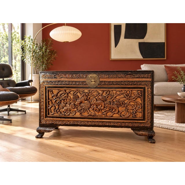 Stunning vintage Chinese hand-carved camphor wood chest. This highly decorative blanket trunk features an incredibly...