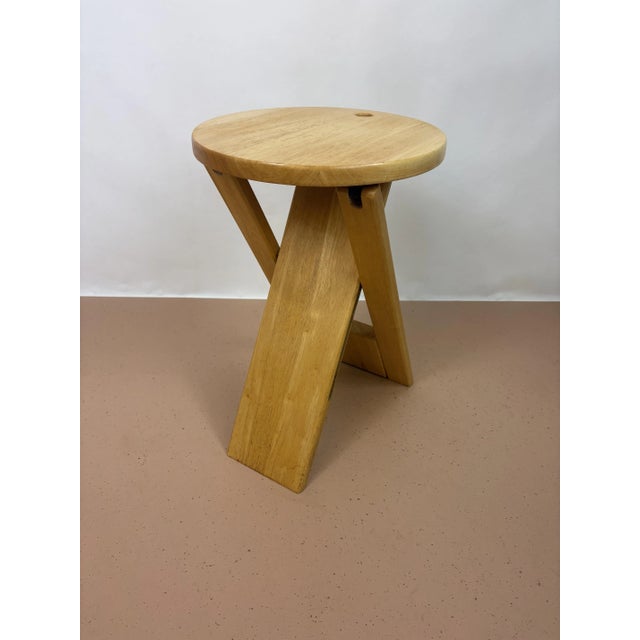 Vintage wooden foldable stool from the 80’s.