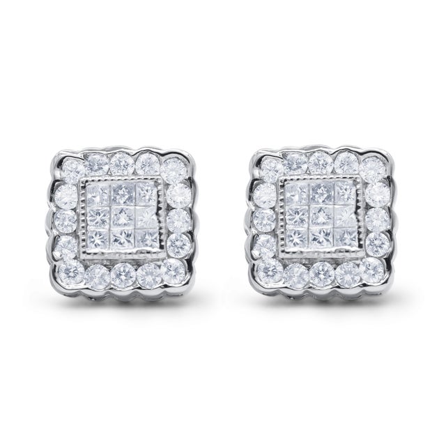 Beautifully crafted of high-quality 14-karat white gold, these stunning square shaped stud earrings hold 1.1 carat of...