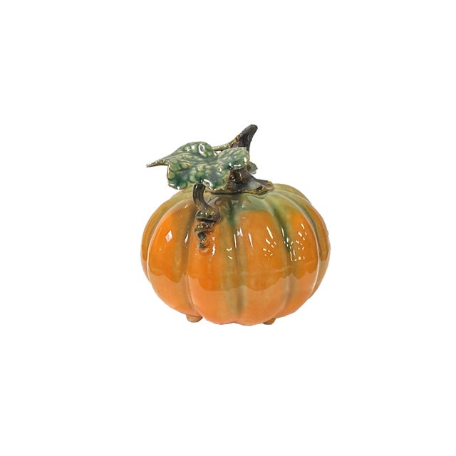 Introducing the Artistic Orange Small Pumpkin with Leaf Ceramic Display Art Figure, a charming and aesthetically pleasing...