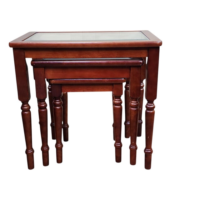 Lovely vintage trio of nesting tables with beveled glass tops, all in excellent condition. Perfect for sunroom or...