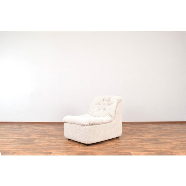 This lounge chair was manufactured in Germany in the 70s. The frame is made of foam, which makes the furniture very light....