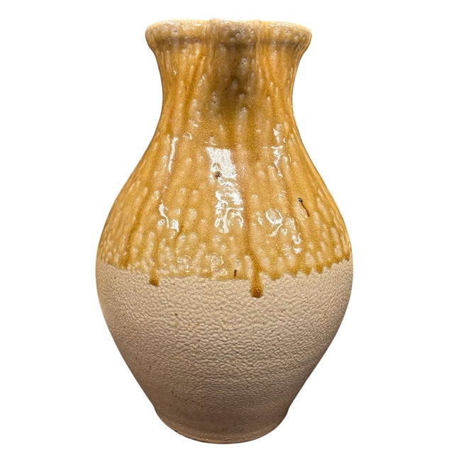 Beautiful handcrafted studio pottery vase, stamped Daniel Johnston, showcasing the artist signature craftsmanship and...