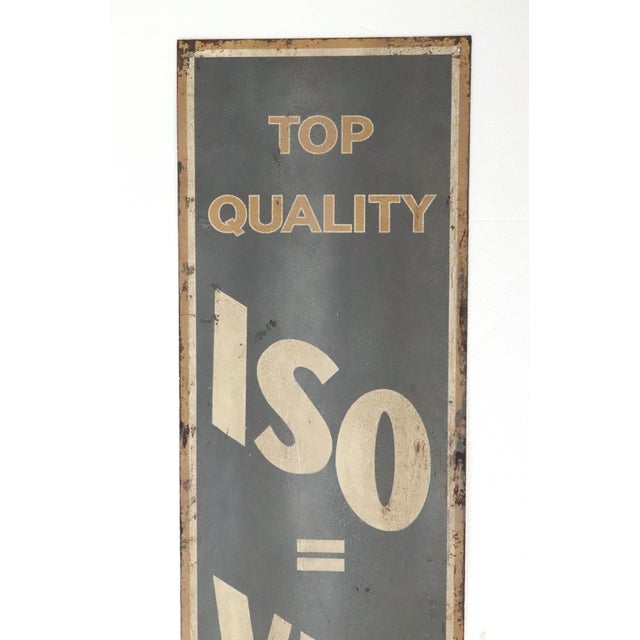 Reclaimed hand painted movie set street sign made of aluminum in gray and tan colors. The signs read "Top Quality ISO =...