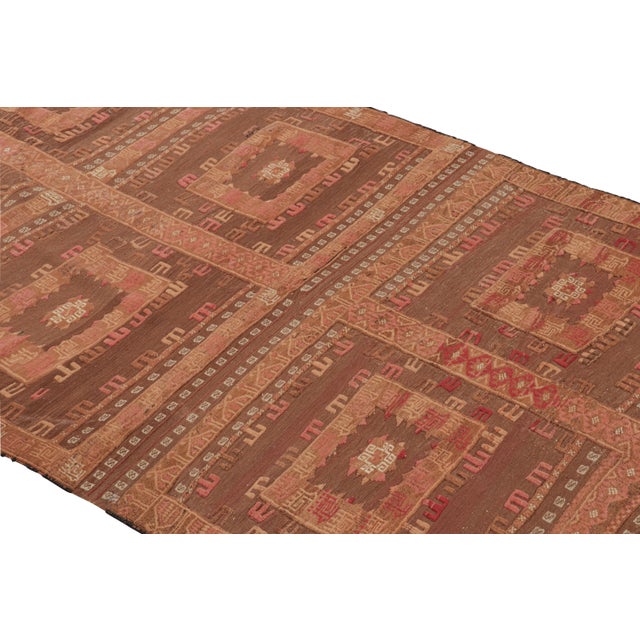 This vintage 4×9 Afghan Kilim is handwoven in wool and originates circa 1950-1960. It boasts an uncommon technique, and a...