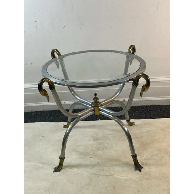 High Style Modernist And Neo Classical Maison Jansen Round Steel Table With Four Brass Swan Head Accents On Top of Table...