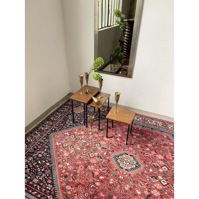 Set consisting of 3 nesting tables in teak and teak veneer with their black square section metal base. modernist inspired,...