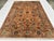 This hand-knotted Sultanabad rug features an elegant allover lattice of rosette palmettes in teal, burgundy, and gold,...