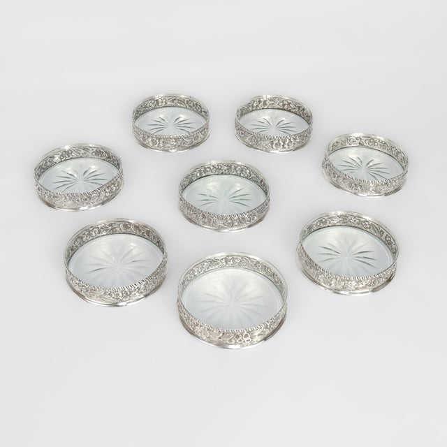 A fine set of 8 antique American glass and silver coasters. By Samuel Kirk & Son. In sterling silver. Sized for a drinking...