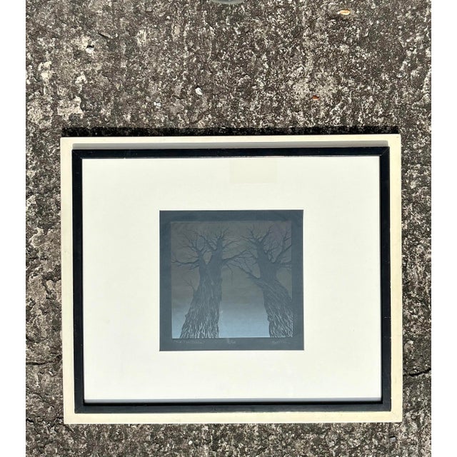 Add a touch of natural elegance and contemplative charm to your space with this vintage Boho tree lithograph, thoughtfully...