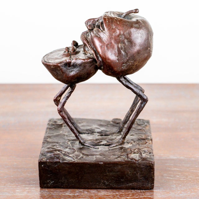 A striking limited edition bronze sculpture titled “Eat or Be Eaten” from the Business Bronze Series by South African...