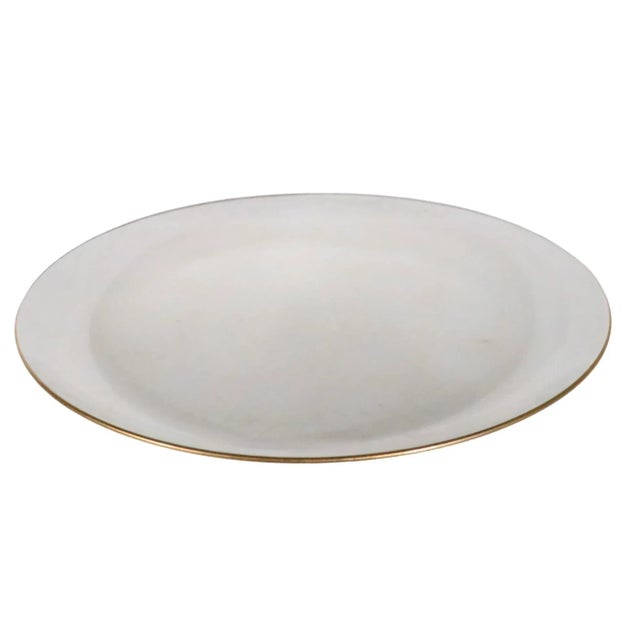 Groovy glass charger having a thin transparent body with allover gold swirl line decoration. The plate is in excellent,...