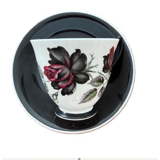 Royal Albert Masquerade is a sought-after vintage bone China pattern featuring a dramatic, bold design of red and black...