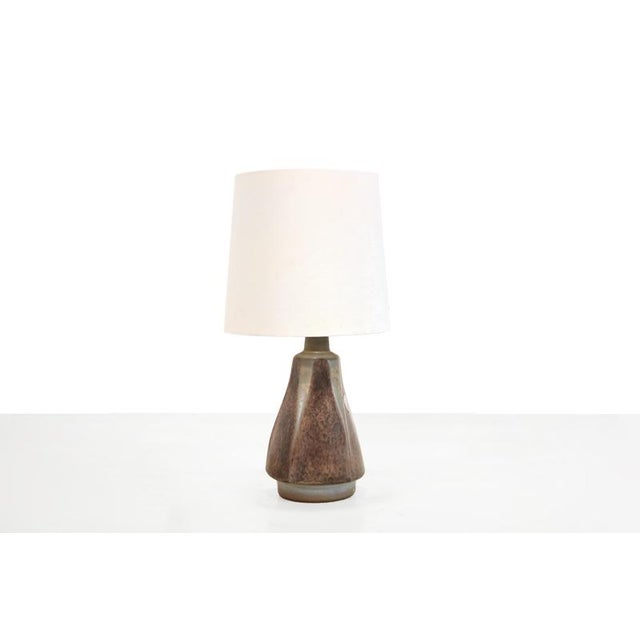 Beautiful Danish design ceramic table lamp with fabric shade. Designed by Marianne Starck for Michael Andersen and...