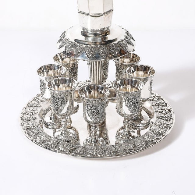 This Mid-Century Modernist silver-plated Kiddush cup set, crafted in Israel during the mid-20th century, is a stunning...