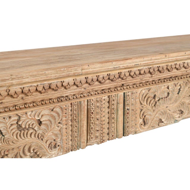 This Console Table Constructed from Antique Indian Carved Elements and Reclaimed Wood features antique side panels and the...
