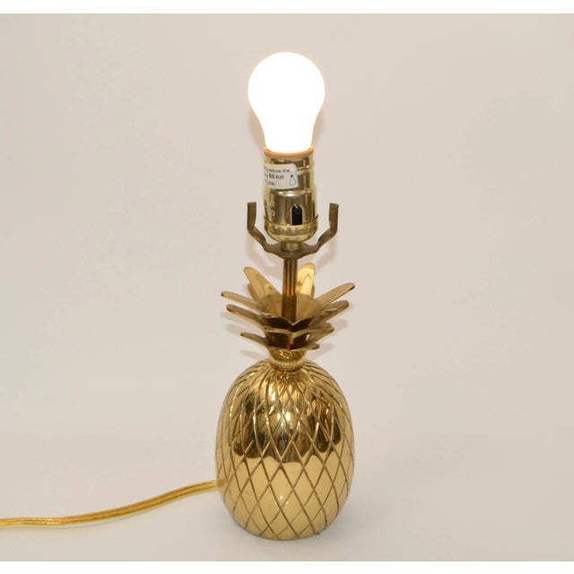 Small Hollywood Regency sculptural polished bronze pineapple table lamp or Bedside Table Light. Has a felt cover to the...